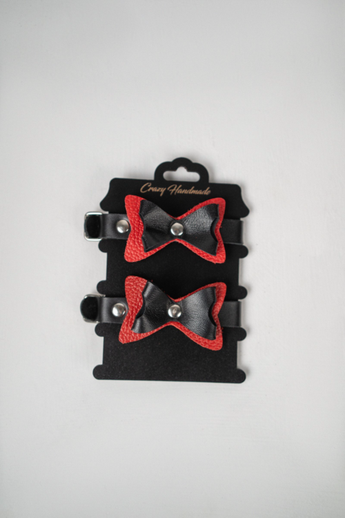 Черно-красные кожаные наручники с бантиками - 1